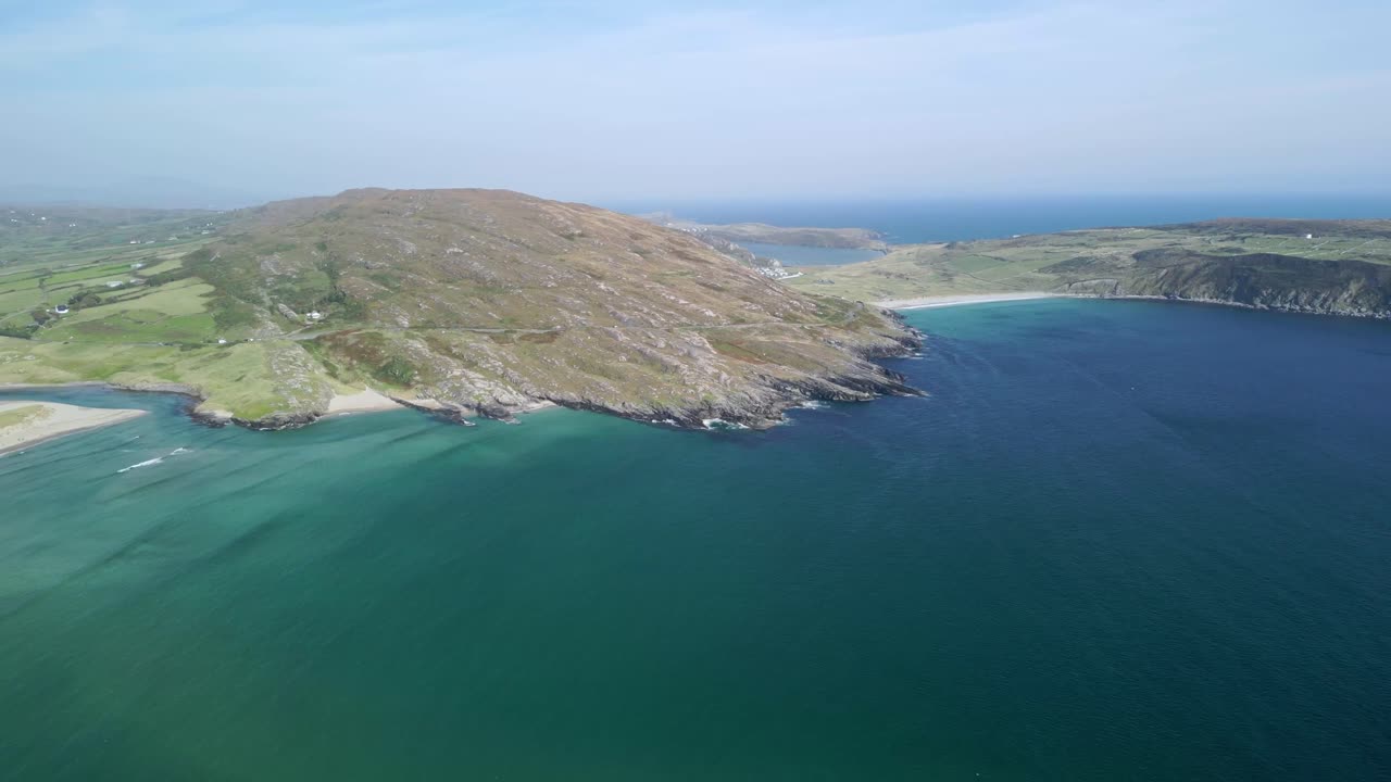 The view from above over Lackenakea Bay Beach, Barleycove beach in West Cork, Ireland with stunning color of the Atlantic ocean, panorama ladnscape
