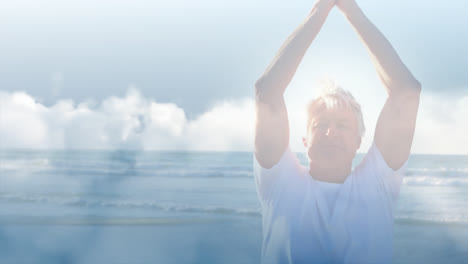 Animación-De-Luz-Brillante-Sobre-Un-Hombre-Mayor-Feliz-Practicando-Yoga-Junto-Al-Mar