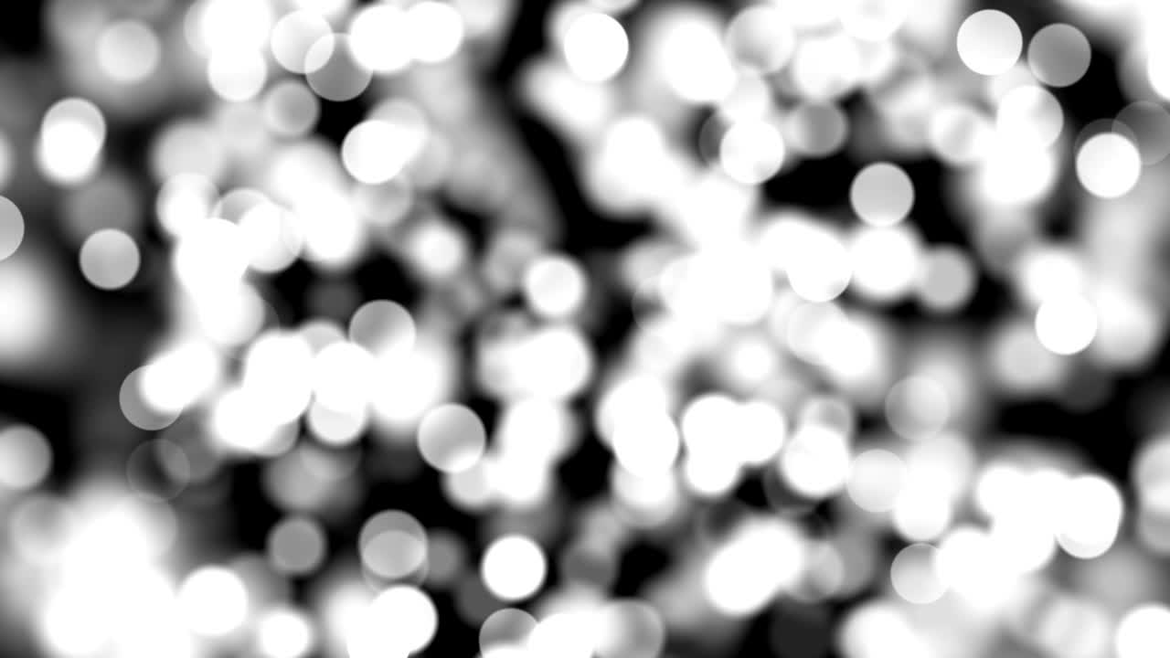 fondo de partículas abstractas desfocadas de 4k (en blanco y negro) - video de stock de bucle