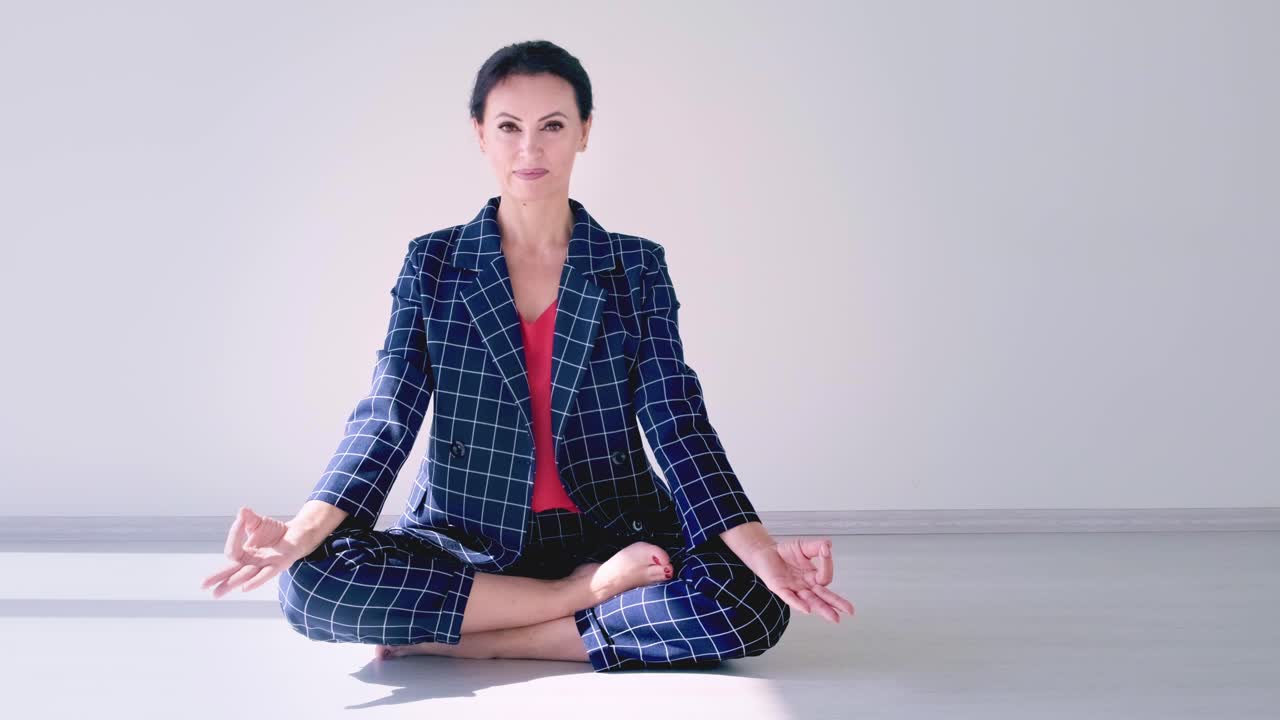 A Professional Woman Practicing Mindfulness and Meditation in a Tranquil Space, Emphasizing Relaxation and Inner Peace through Focused Breathing and Positive Energy