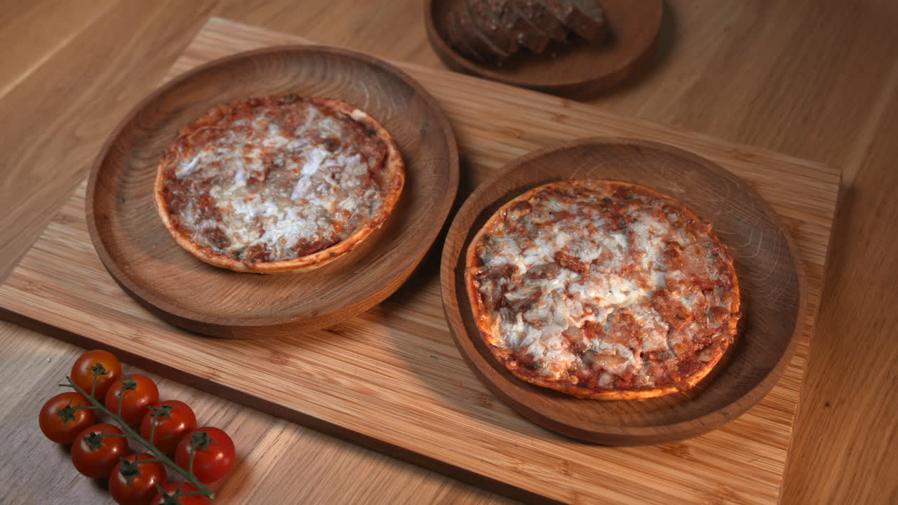 Food on Wooden Plates with Cherry Tomatoes and Bread