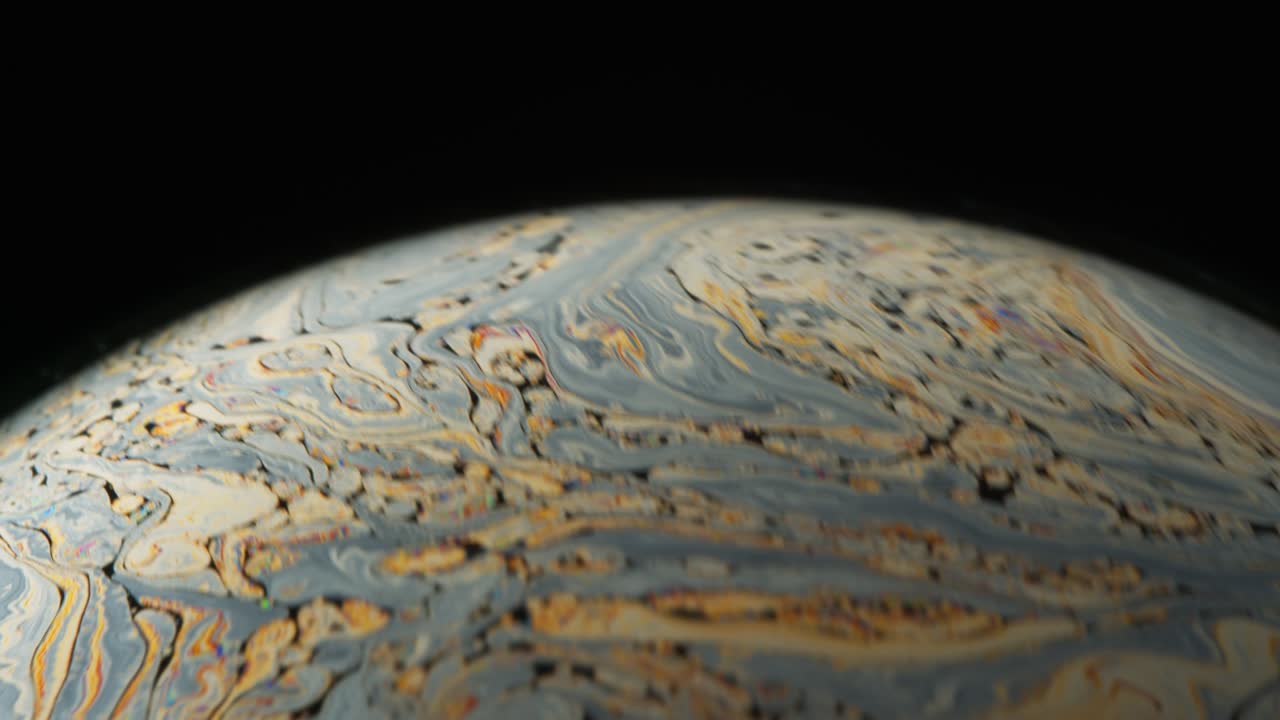 Black Background and Beautiful Swirling Abstract Motion of Soap Suds