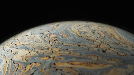 black background and beautiful swirling abstract motion of soap suds