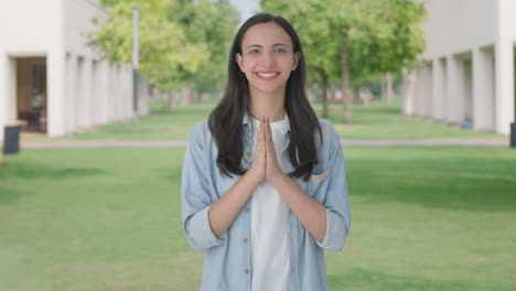 Happy-Indian-girl-doing-Namaste