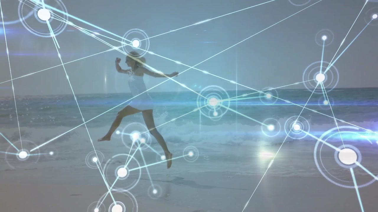 Woman running barefoot on wet sand activating pulsing nodes and expanding digital network overlay