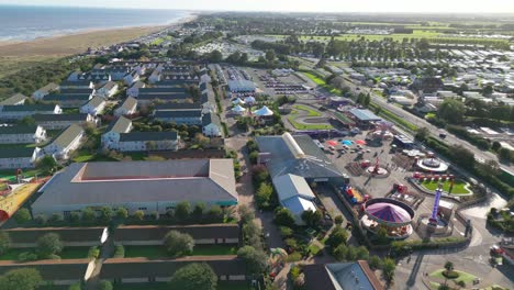 Aerial-drone-footage-of-the-famous-Butllins-holiday-camp-based-in-the-seaside-town-of-Skegness-Lancashire,-UK