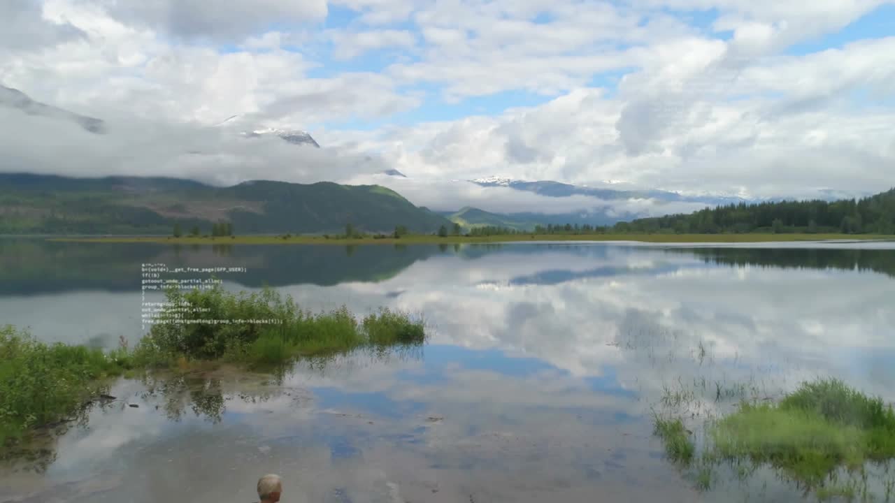 Objevuje se technologická telemetrie, žena fotografuje alpské jezero, dron stoupá a záznamy mizí.