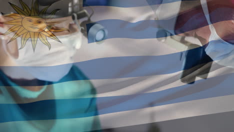 animation of flag of uruguay waving over surgeons in operating theatre