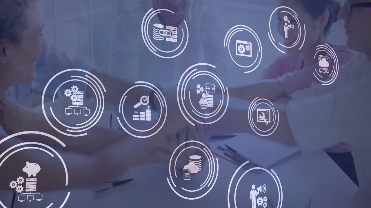 múltiples iconos digitales contra un grupo de diversos colegas de oficina apilando sus manos juntos
