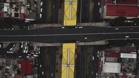 elevated highway crossing the metro system in ecatepec, mexico