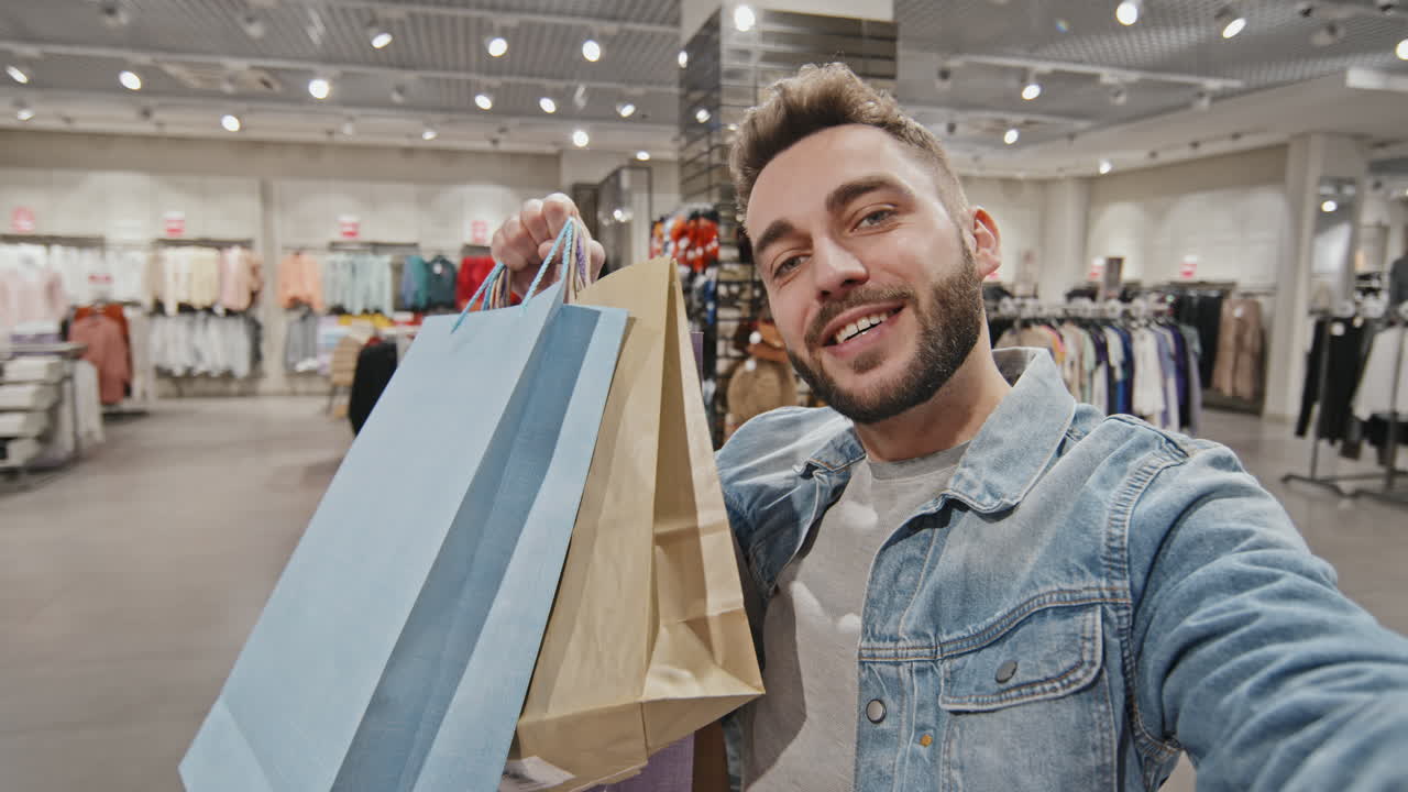 POV Of Man Video Chatting In Shopping Centre