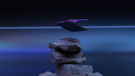 foldable phone on rocks