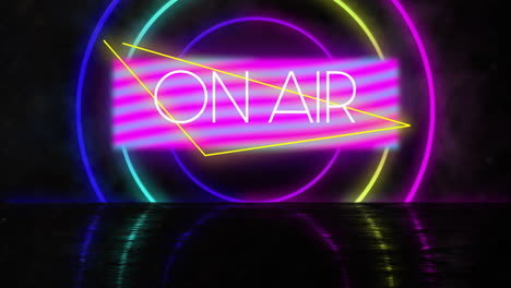 animation of on air text over neon shapes on black background