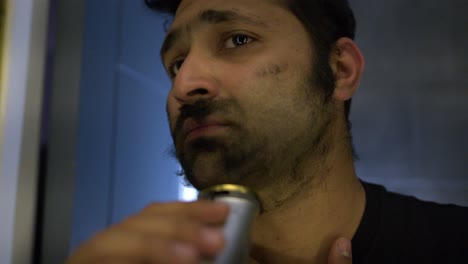 psychopath shaving his thick beard with different emotions, crying, smiling, thinking, and more