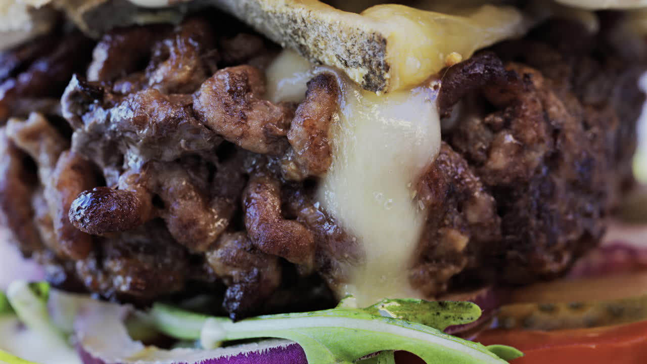Close up of a hamburger on a plate at a restaurant
