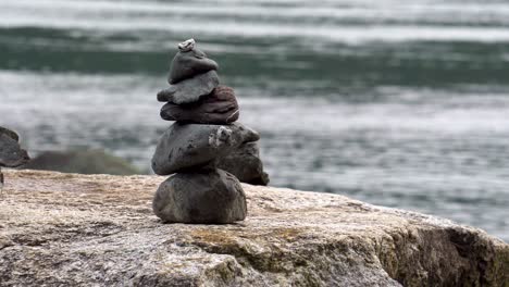 small cairn sitting on boulder