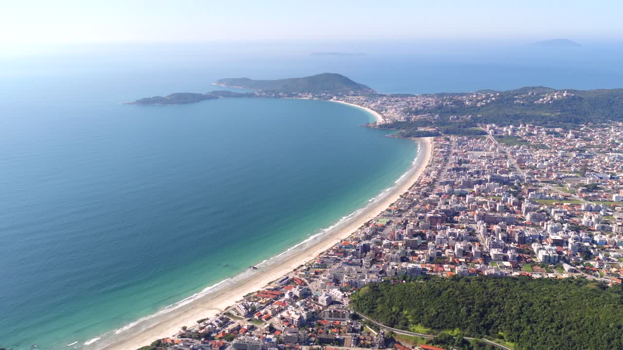 Expansive Aerial Panorama Captures the Stunning Coastal Beauty of Bombas and Bombinhas Beaches in Santa Catarina Brazil Showcasing Pristine Sands Azure Waters and Lush Greenery