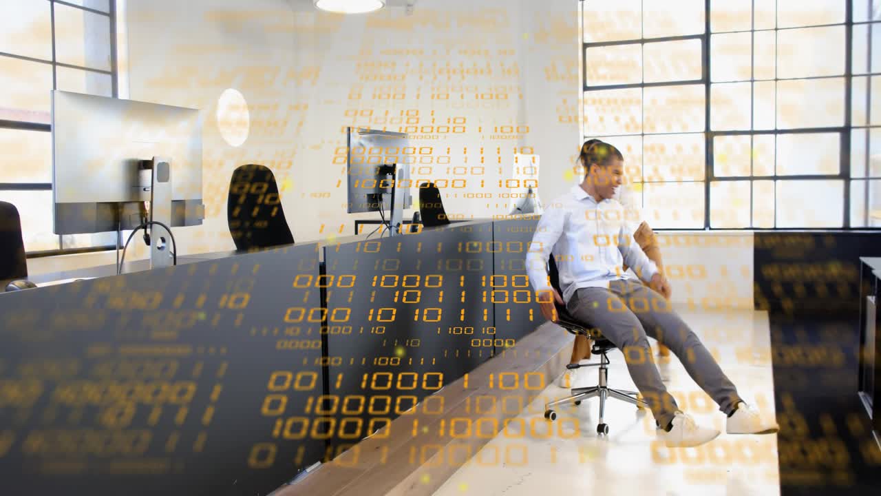 Woman pushing man in rolling business chair causing spin bonding while binary overlay across scene