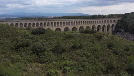 scrubland on a hill discovering the aqueduct roqueflavour ventabren france