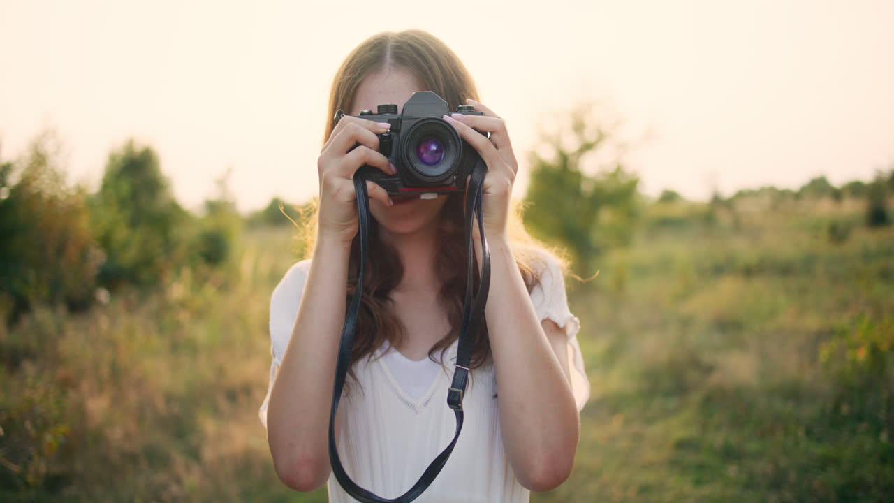 Joyful girl creating memories on film