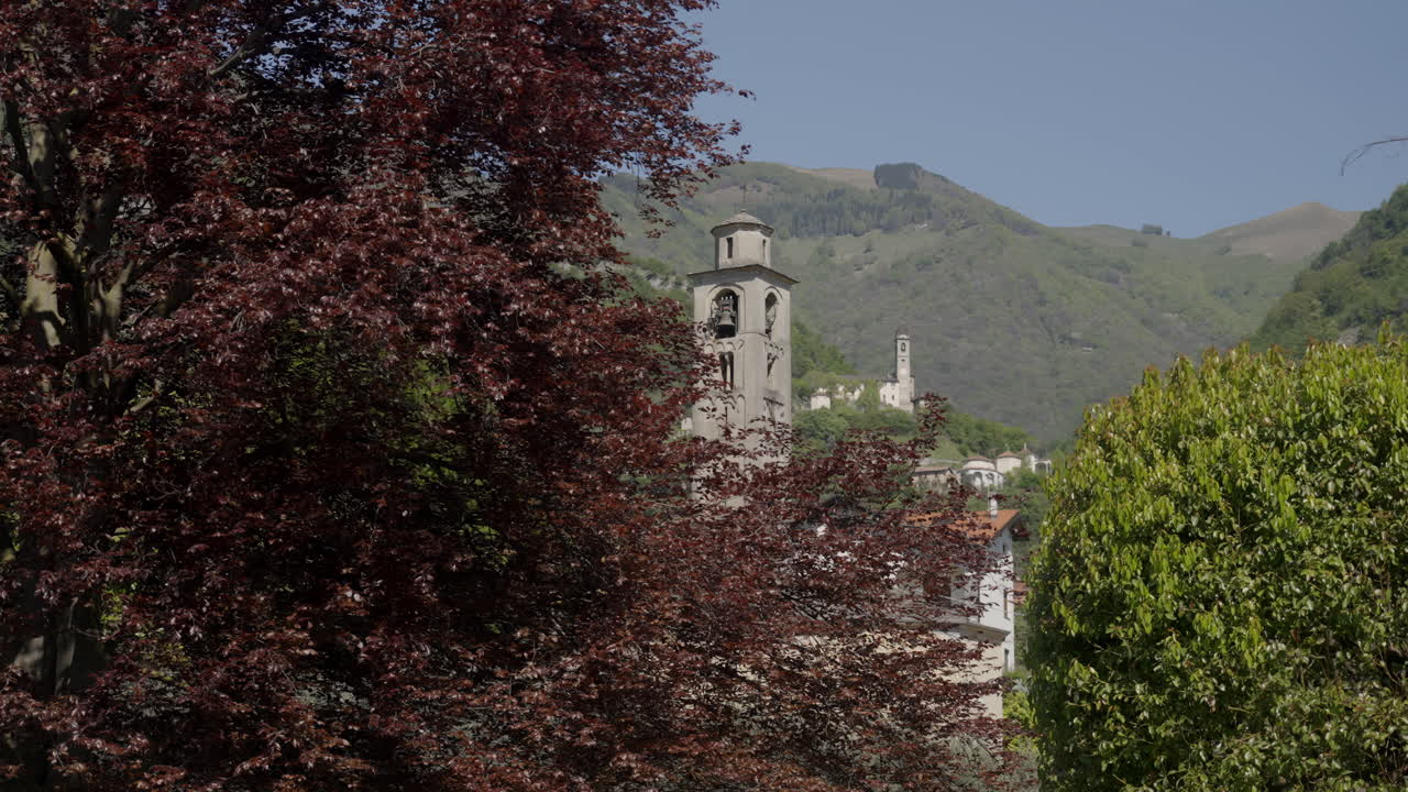 Alpine Church Tower with Mountain View