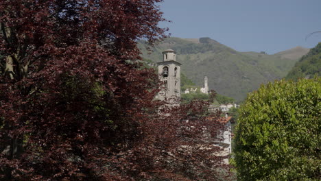 alpine church tower with mountain view