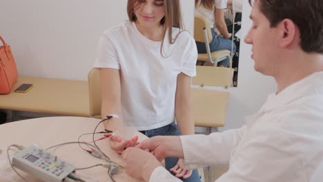 patient nerves testing using electromyography at medical center