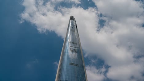 tall building  bright weather beautiful sky.