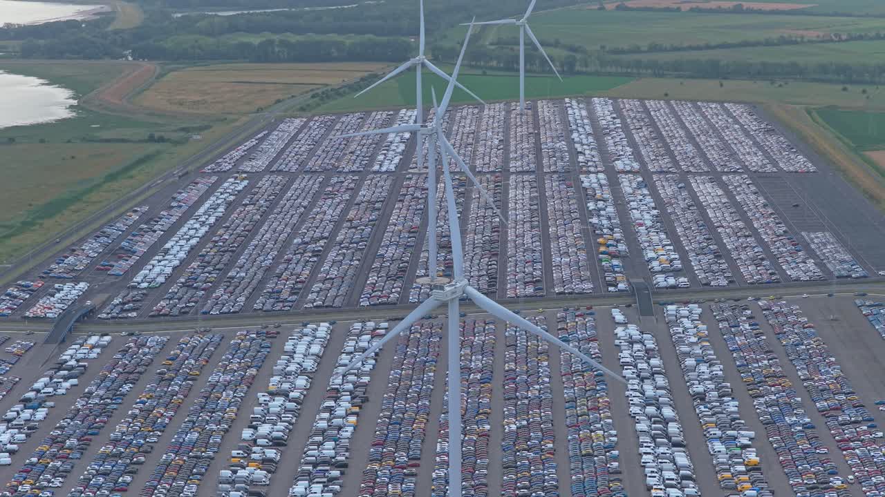 Aerial overhead view of cars in shipping and logistics yard