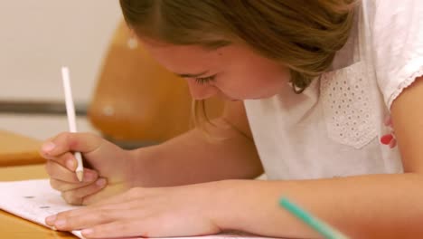 Cute-child-drawing-at-school