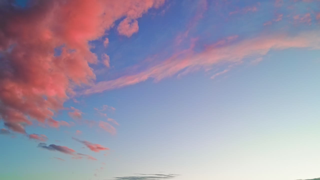 View of the blue sky with colored clouds at sunset. Chisinau, Moldova