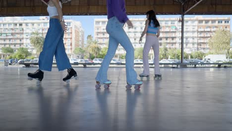 women roller skating in an urban setting