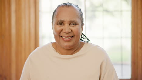 smile, face and senior woman at her home