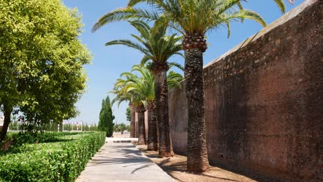 tilt down shot of the walls of the fortified village of mascarell, spain