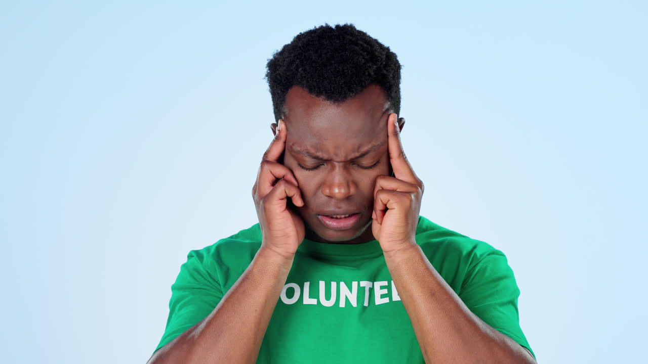 Sick, volunteer and black man with a headache