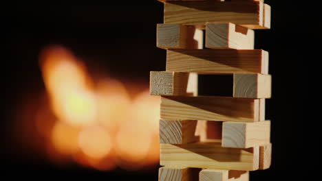 tower of wooden blocks collapses slow video