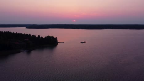 scenic view of stockholm archipelago in sweden during sunset in summertime, aerial wide shot