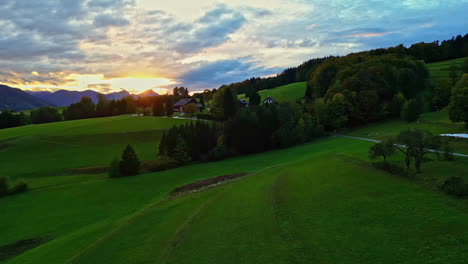 aerial view of the small village of attersee at an autumn sunset in upper austria