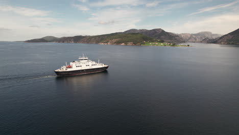 aerial side view of a car ferry crossing a beautiful fjord in norway, lauvvika-oanes, near stavanger, summer sunny day