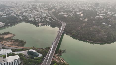 captivating top view of hyderabad bridge in the city blending greenery with urban development