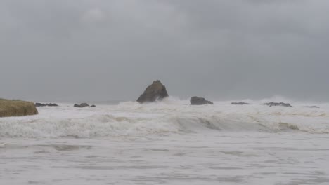 stormy waves at currumbin alley in gold coast, australia during cyclone alfred - wide shot