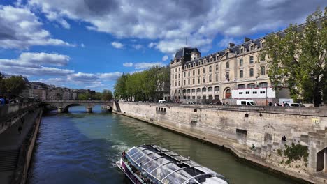seine river boat paris capital of france with people walking summer day