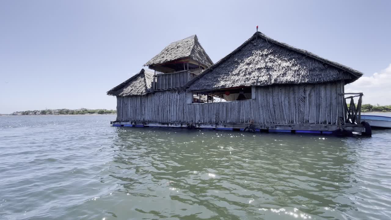 floating restaurant in Lamu coastal Swahili town in Kenya