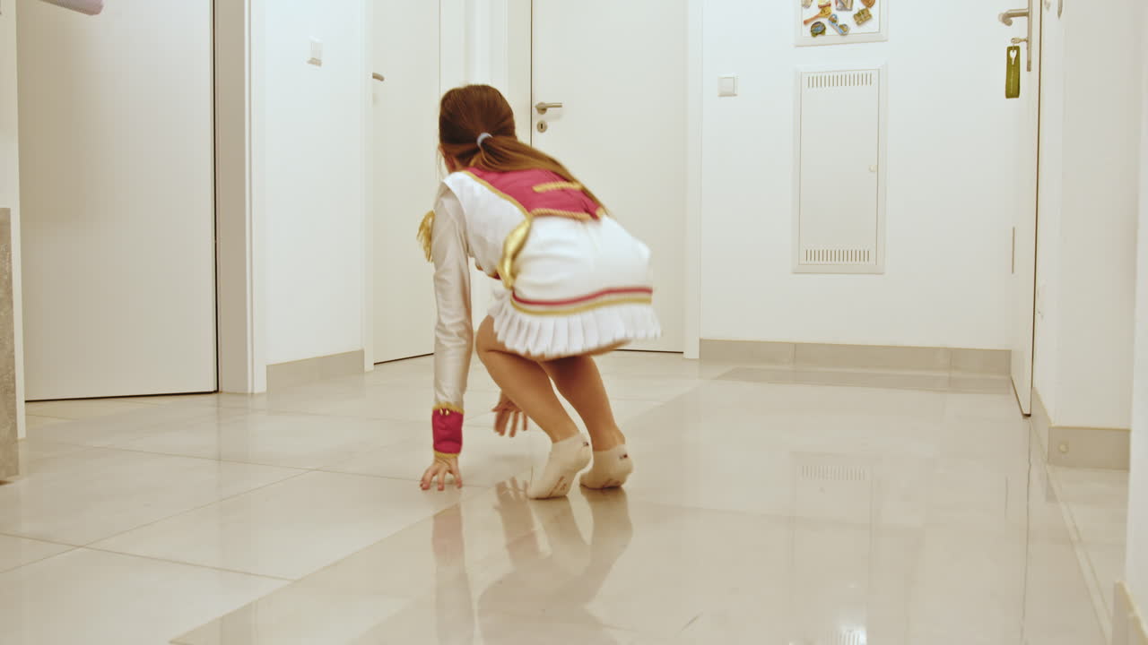Child Dancing in a Hallway