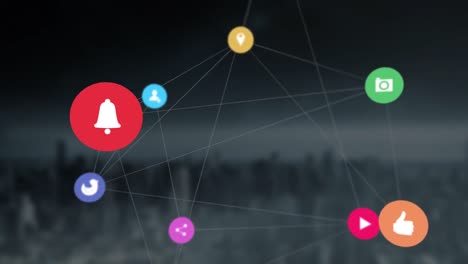 animation of a web of connections with white social icons over a cityscape.