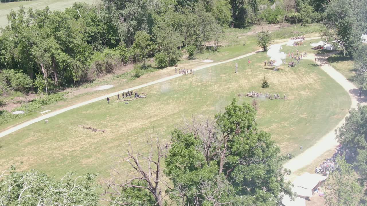 Aerial Shot of Two Civil War Squads Firing at Each Other on the Battlefield