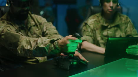 military personnel engaged in virtual training simulation