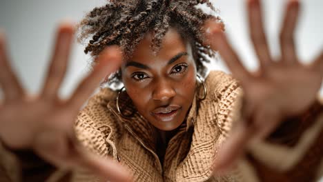young black woman performing modern dance poses in slow motion