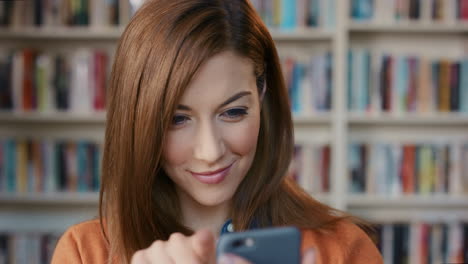 Happy-Beautiful-woman-using-smart-phone-at-home