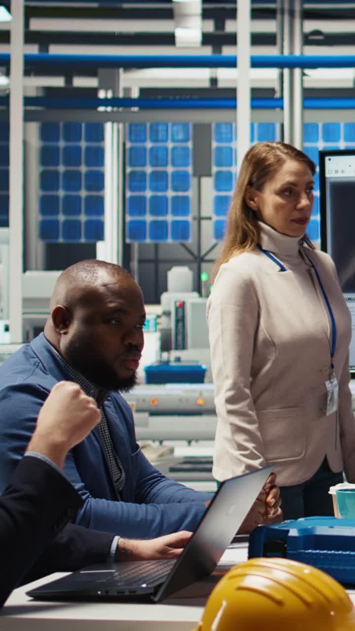 Vertical video Shareholders meeting in photovoltaics plant, analyzing market trends